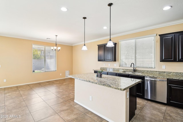 kitchen with sink, decorative light fixtures, a center island, and dishwasher