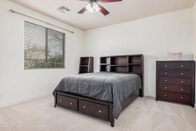 bedroom with baseboards, visible vents, a ceiling fan, and light colored carpet