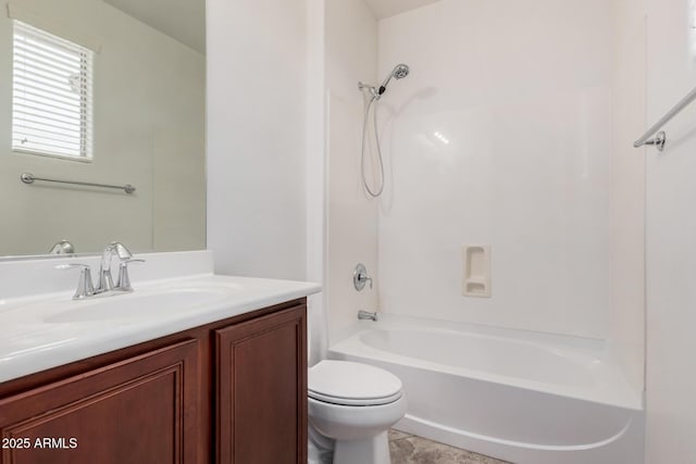 bathroom featuring toilet, shower / bathing tub combination, and vanity