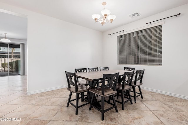 dining area with an inviting chandelier, baseboards, visible vents, and light tile patterned flooring