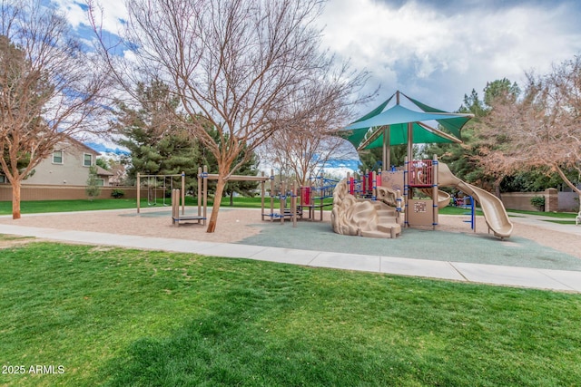 community jungle gym with a lawn