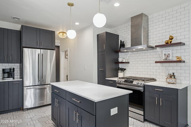 2310 N 11th St, Phoenix, AZ 85006 - kitchen with stainless steel appliances, wall chimney exhaust hood, open shelves, light countertops, and recessed lighting