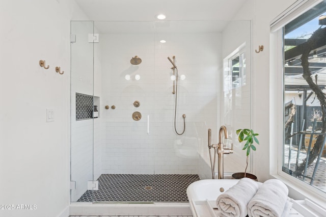 2310 N 11th St, Phoenix, AZ 85006 - bathroom featuring a stall shower, a freestanding tub, and recessed lighting