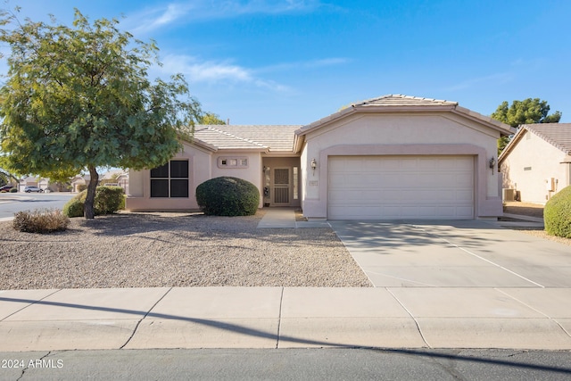 single story home featuring a garage