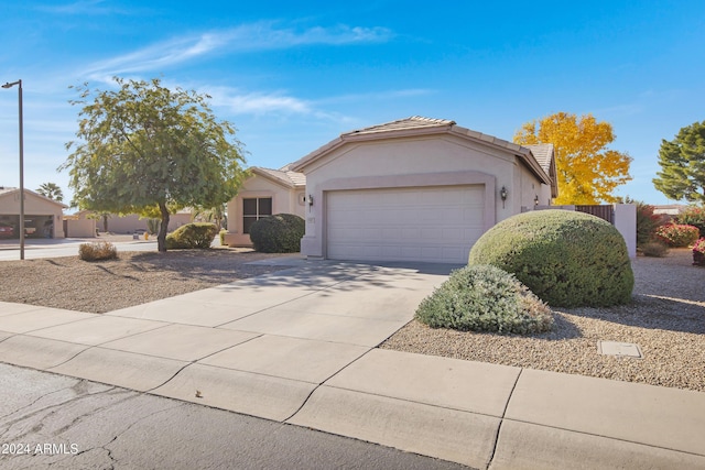 single story home featuring a garage