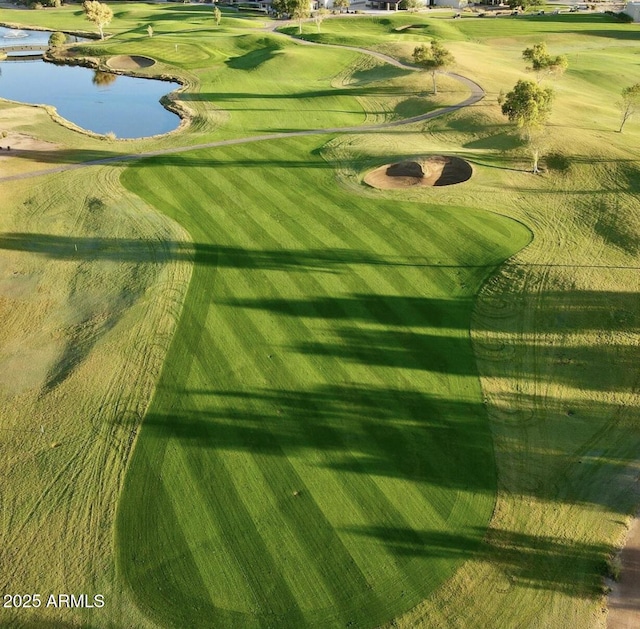 view of community featuring a water view and view of golf course