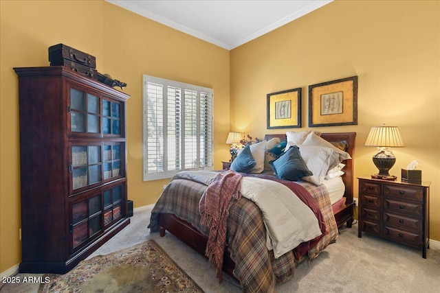 bedroom featuring carpet, crown molding, and baseboards