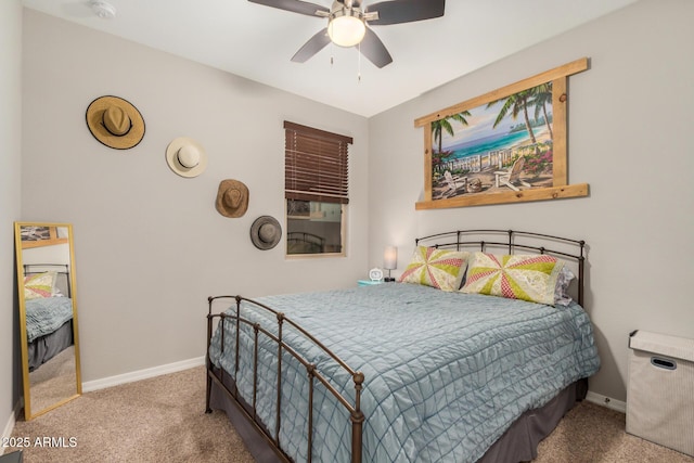 bedroom featuring baseboards, carpet, and a ceiling fan