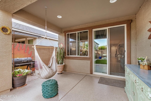 view of patio / terrace featuring a balcony