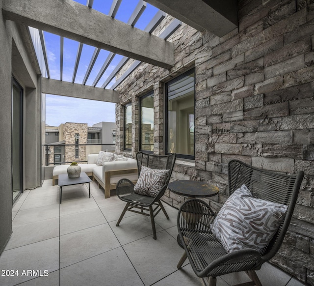 view of patio / terrace featuring a pergola and an outdoor living space