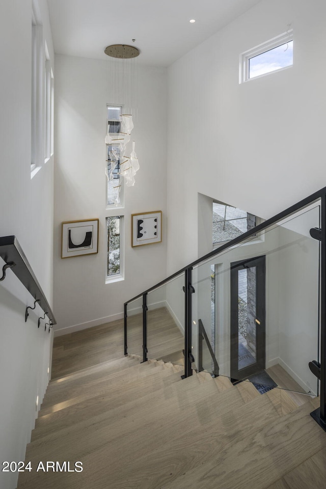 staircase featuring hardwood / wood-style floors