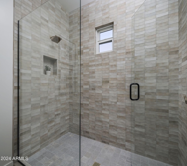 bathroom with an enclosed shower