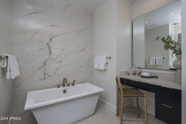 bathroom with a bathtub, tile flooring, and tile walls