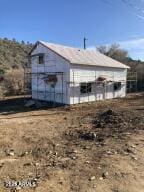 view of outbuilding with an outdoor structure