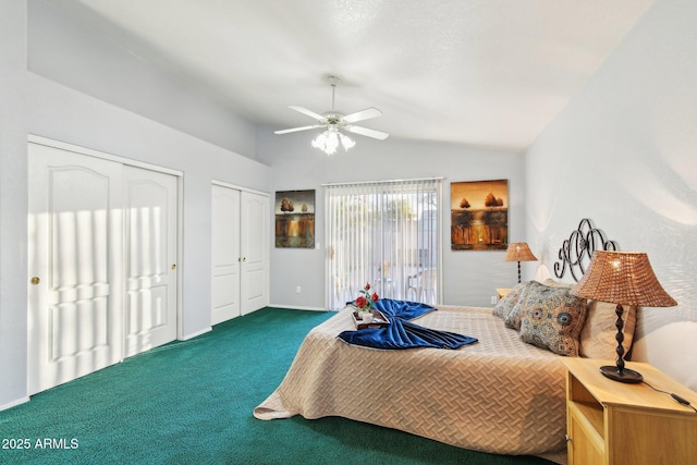 bedroom featuring ceiling fan, two closets, dark colored carpet, and vaulted ceiling