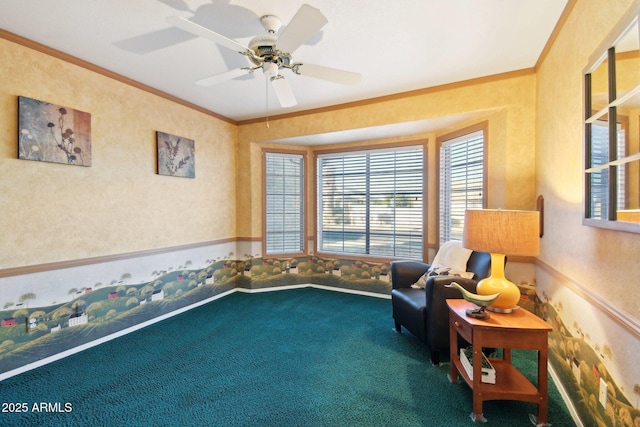 living area featuring ceiling fan, ornamental molding, and carpet flooring