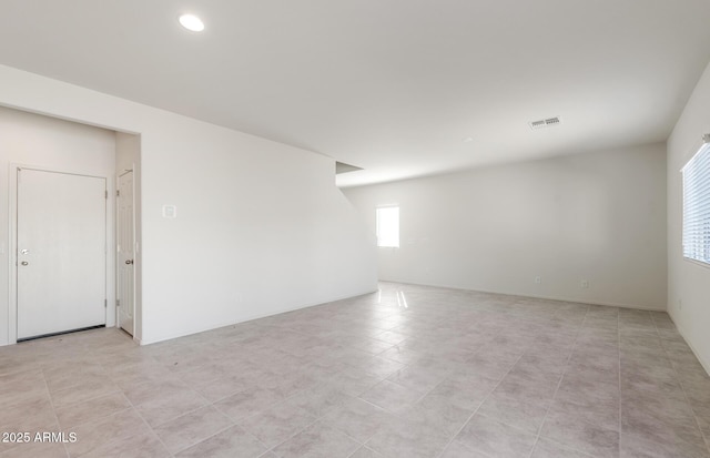 4993 S 254th Dr, Buckeye, AZ 85326 - empty room with recessed lighting and light tile patterned floors