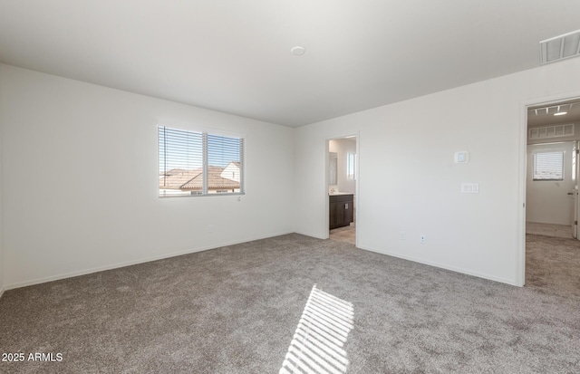 4993 S 254th Dr, Buckeye, AZ 85326 - empty room with light carpet and baseboards