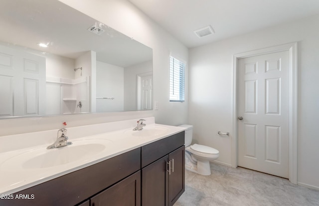 4993 S 254th Dr, Buckeye, AZ 85326 - full bathroom with double vanity, toilet, baseboards, and a shower