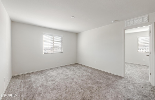 4993 S 254th Dr, Buckeye, AZ 85326 - unfurnished room featuring carpet, baseboards, and a smoke detector
