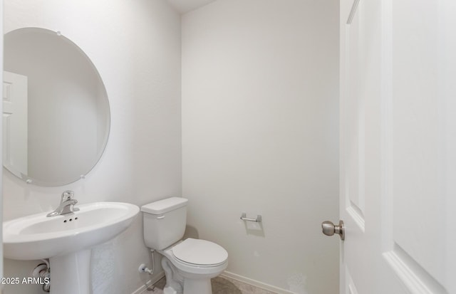 4993 S 254th Dr, Buckeye, AZ 85326 - bathroom featuring toilet, baseboards, and tile patterned flooring