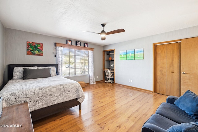 bedroom featuring ceiling fan and light wood-type flooring