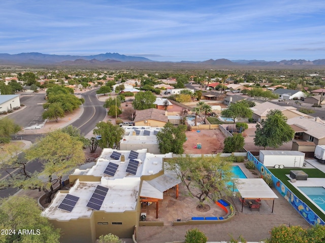 birds eye view of property featuring a mountain view