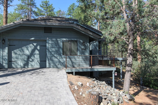 exterior space with a garage