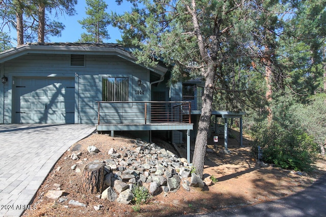 view of home's exterior featuring a deck