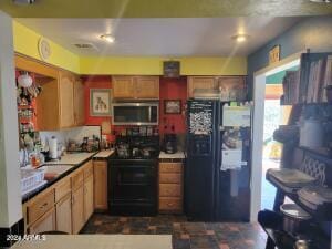 kitchen with black appliances