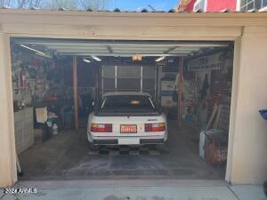 garage with a carport