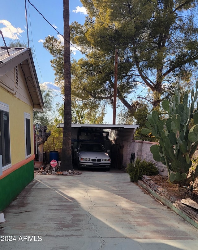 view of home's exterior featuring a carport