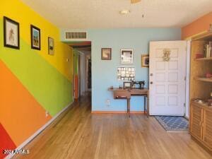 interior space with hardwood / wood-style flooring