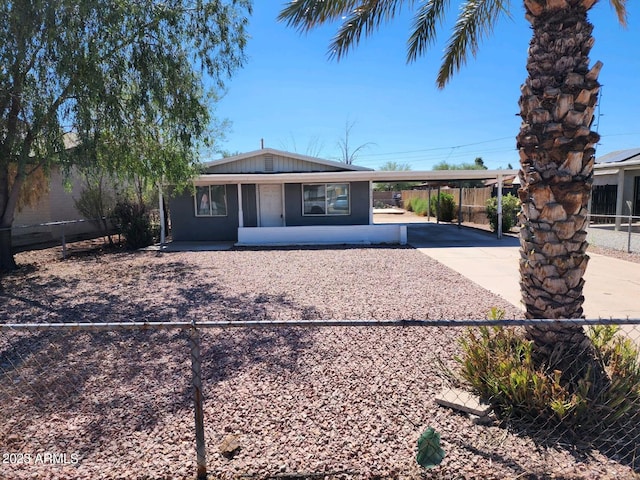 view of front of house featuring a carport