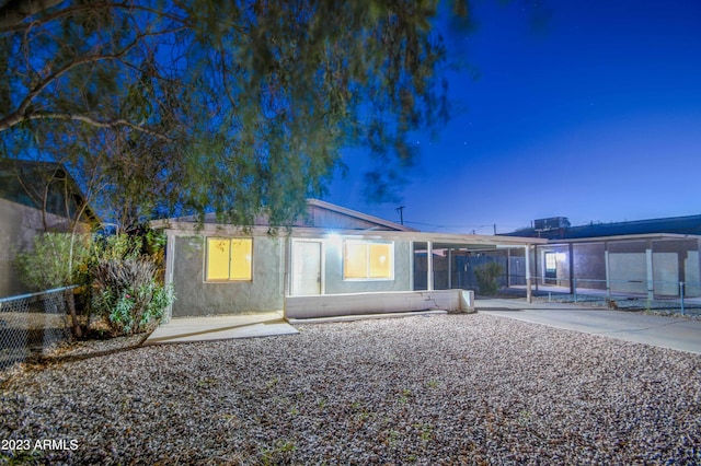 rear view of property with a patio area