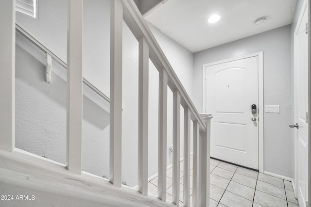 view of tiled foyer entrance