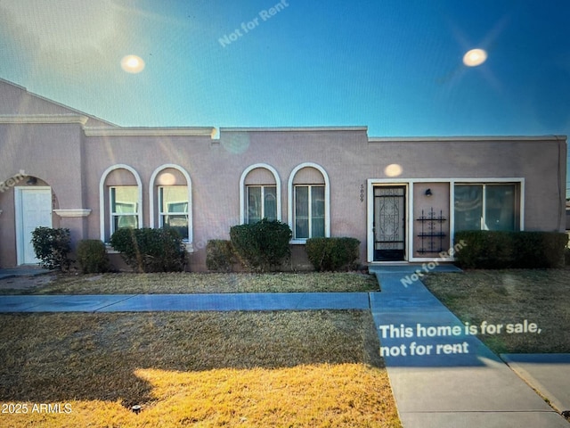 view of front of home featuring stucco siding