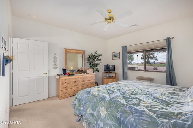 bedroom featuring carpet, visible vents, and ceiling fan