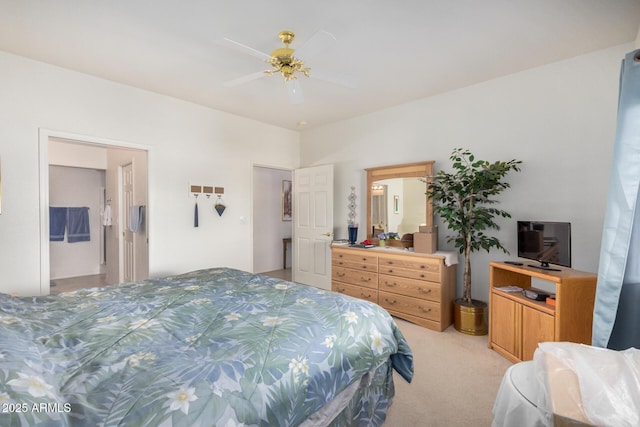 bedroom with light carpet and ceiling fan