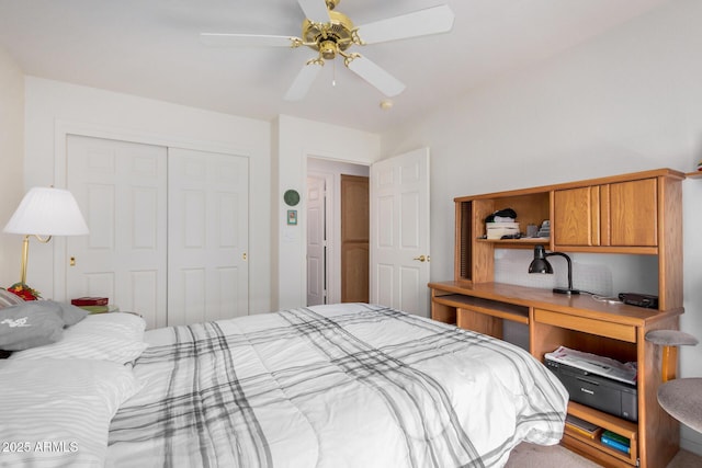 bedroom with a ceiling fan and a closet