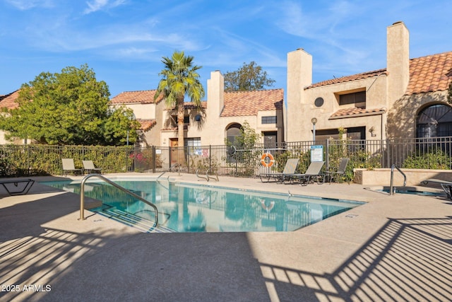 view of pool featuring a patio