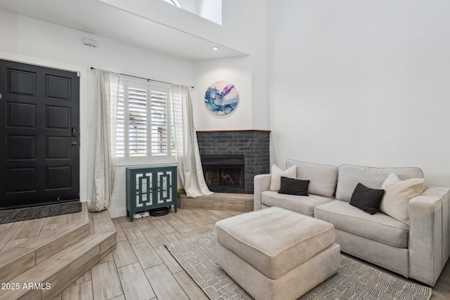 living room featuring a fireplace