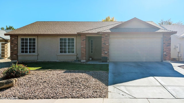 ranch-style home with a garage