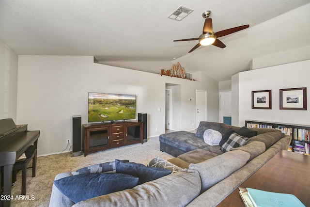 carpeted living room with vaulted ceiling and ceiling fan