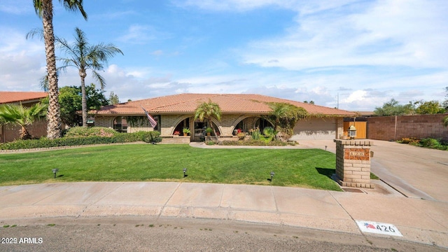 426 E Carol Ann Way, Phoenix, AZ 85022 - view of front of house with a tile roof, concrete driveway, and a garage