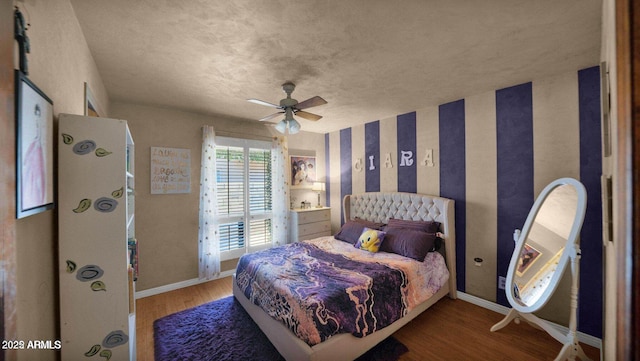 426 E Carol Ann Way, Phoenix, AZ 85022 - bedroom with wood finished floors and a ceiling fan