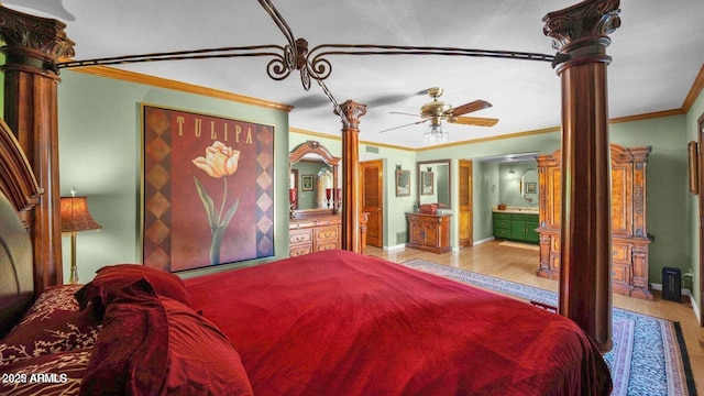 426 E Carol Ann Way, Phoenix, AZ 85022 - bedroom with ornamental molding, wood finished floors, and ensuite bath