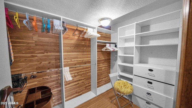 426 E Carol Ann Way, Phoenix, AZ 85022 - walk in closet with wood finished floors