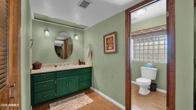426 E Carol Ann Way, Phoenix, AZ 85022 - bathroom with wood finished floors and vanity