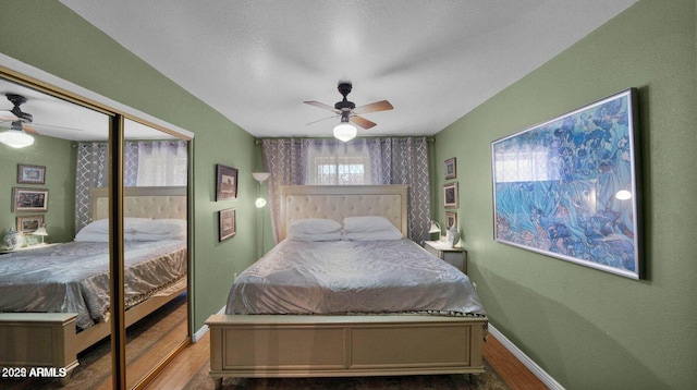 426 E Carol Ann Way, Phoenix, AZ 85022 - bedroom with wood finished floors, ceiling fan, and a closet